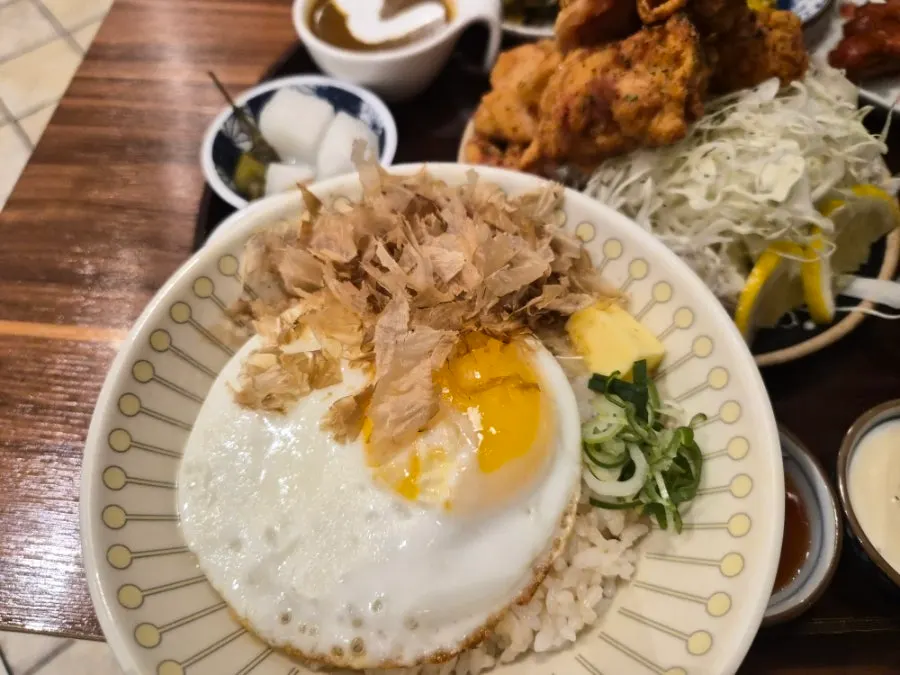Soy egg rice topped with bonito flakes and butter