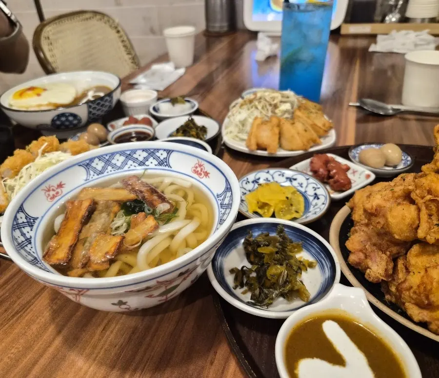 A warm bowl of udon added to the set