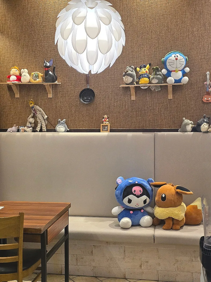 Seating area with Kuromi and Eevee dolls
