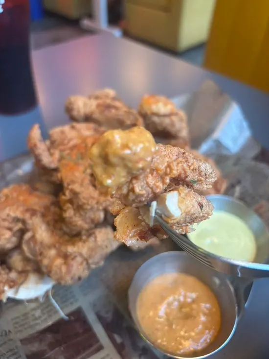 A generously portioned plate of chicken strips