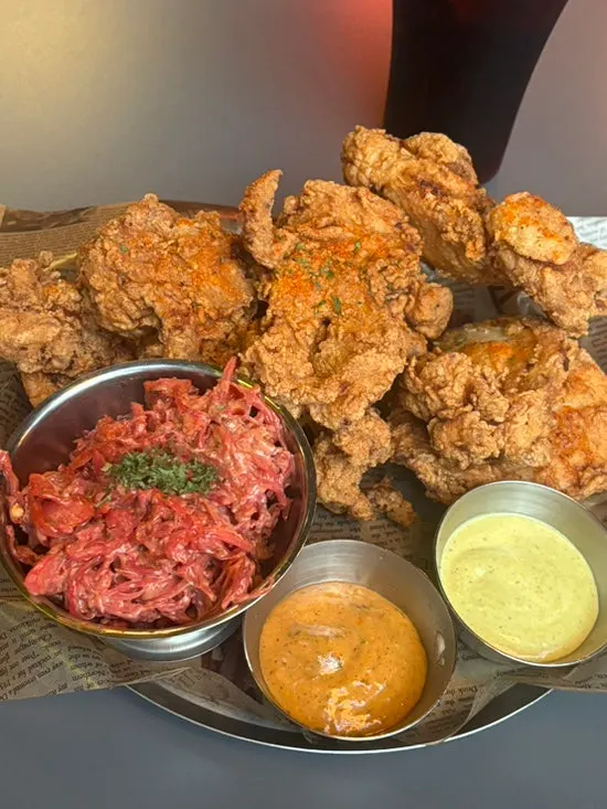 Cross-section of chicken strip showing boneless thigh meat