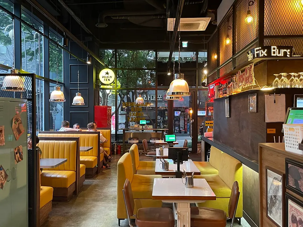 Brightly lit seating area at Daily Fix