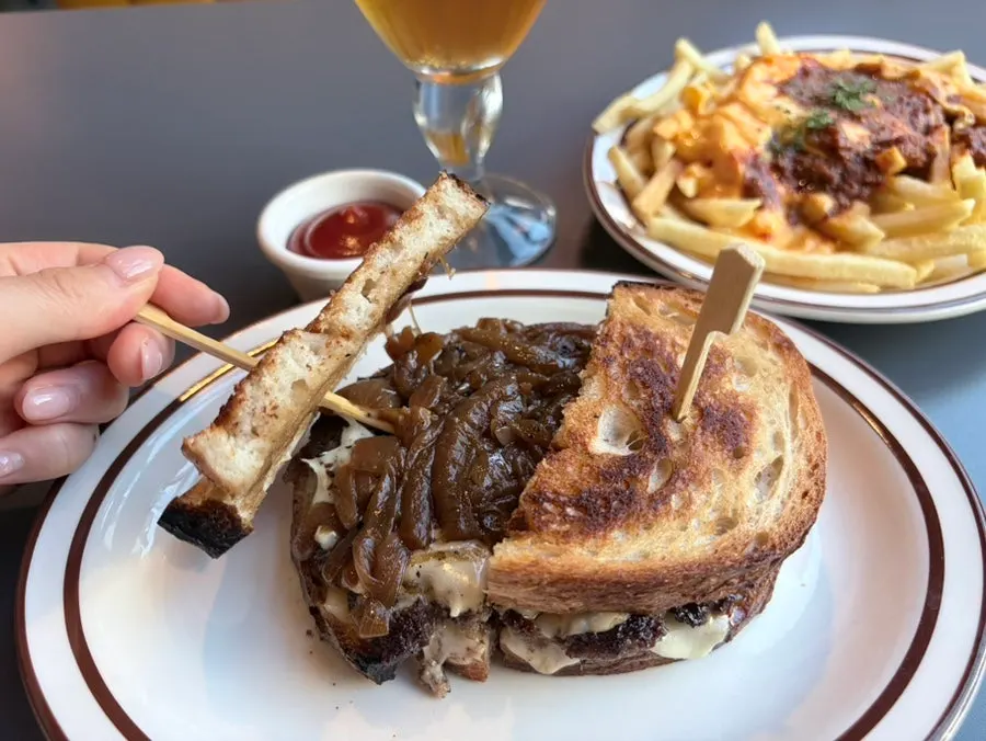 Cross-section of the patty melt showing patty and caramelized onions