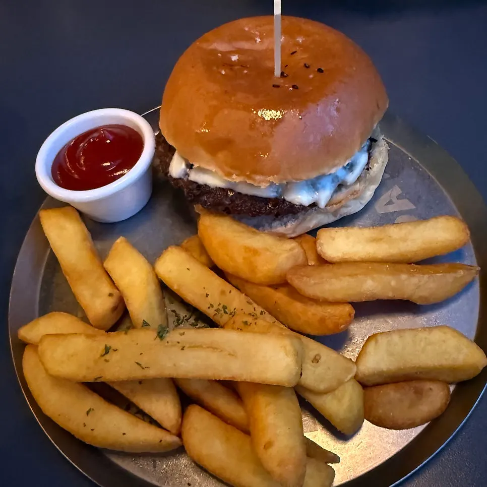 Bacon Cheese Burger showing smoked bacon and beef patty