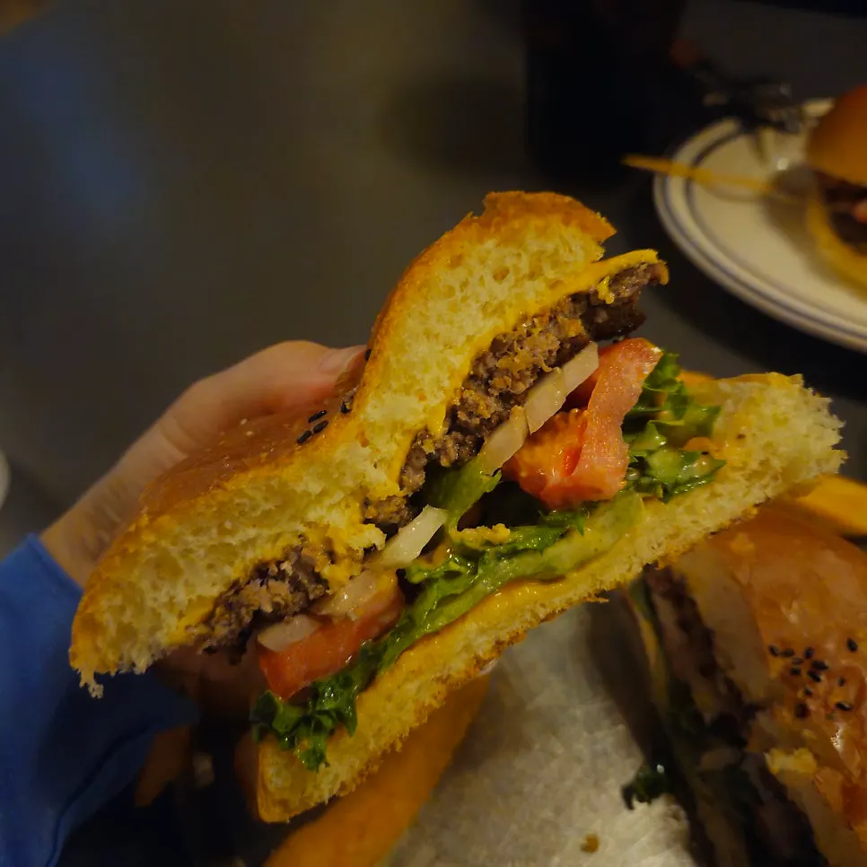 A bite taken out of the Classic Burger