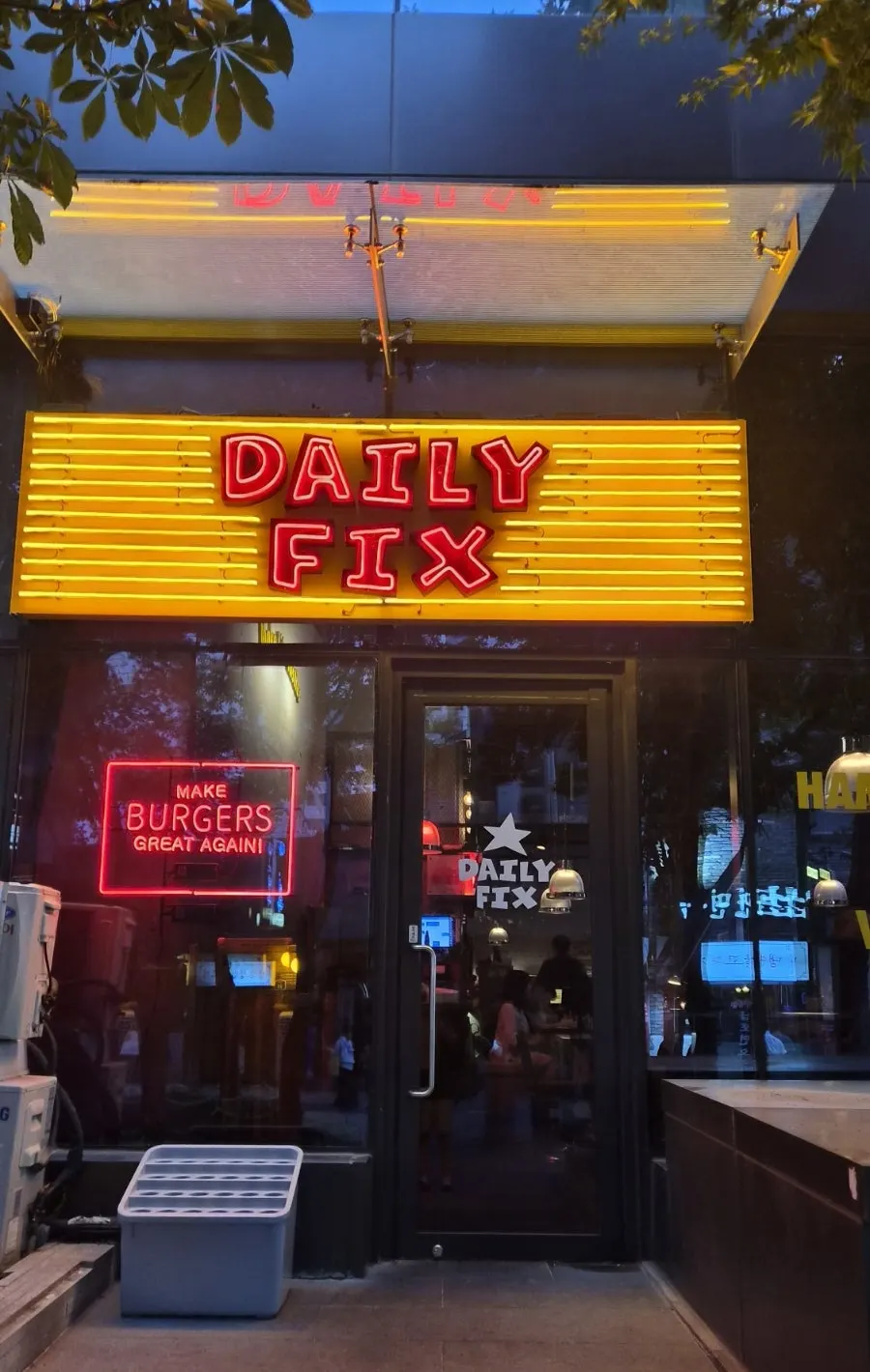 Daily Fix Euljiro exterior lit up with evening neon signs