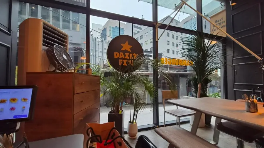 Wide view of the Daily Fix dining area with customers seated