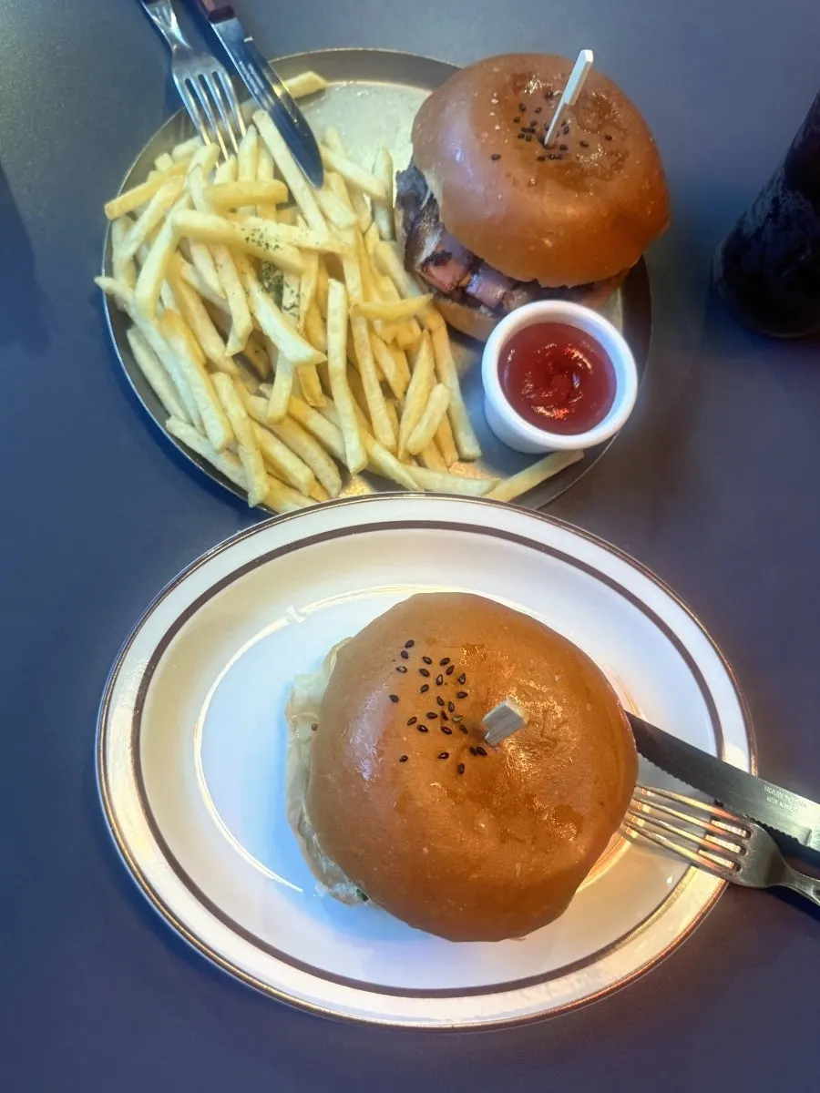 Table set with the ordered burgers and sides
