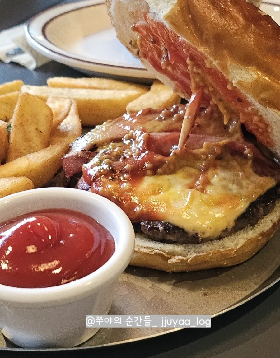 Craft burger with pretzel bun swap at Daily Fix