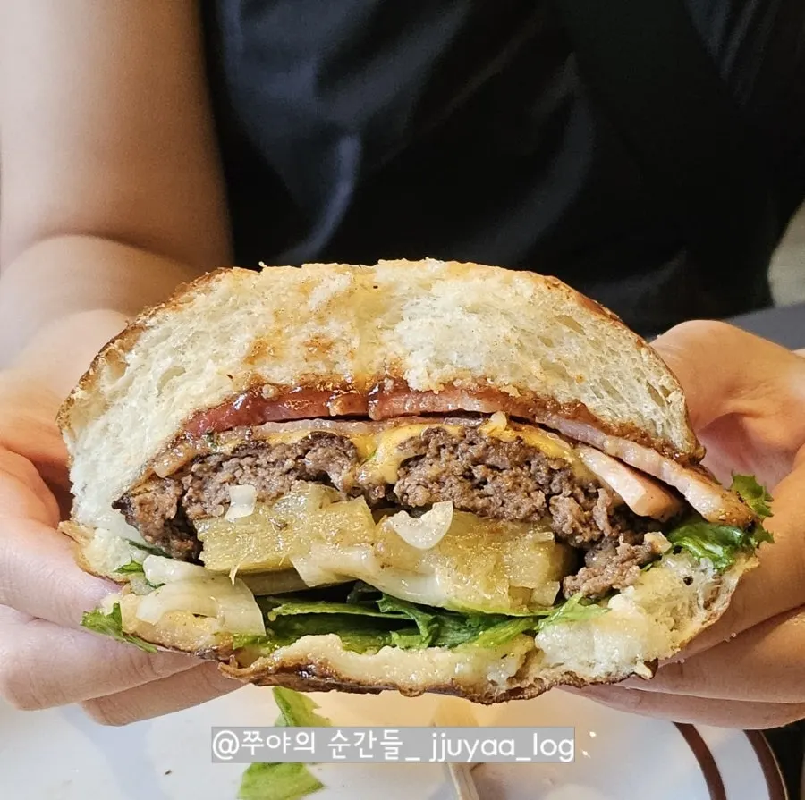 Cross-section of the Hawaiian burger with grilled pineapple