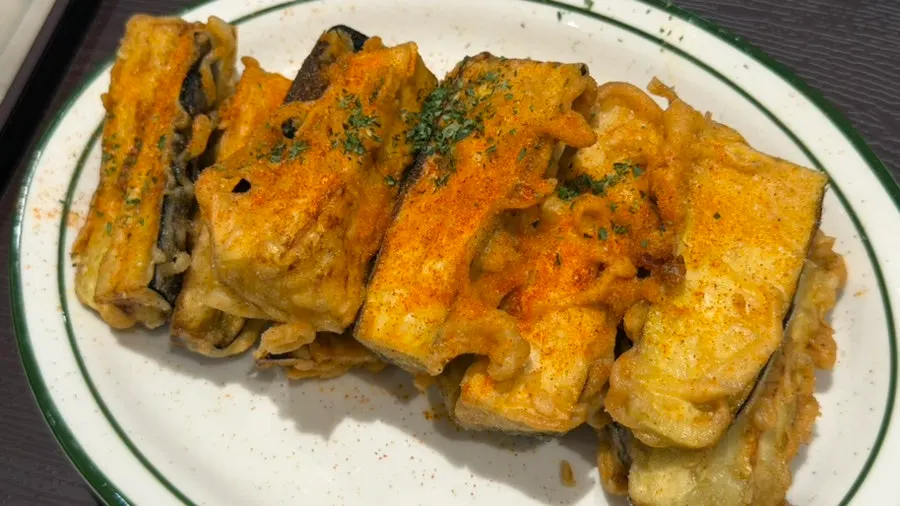 Signature eggplant fritters served with special sauce