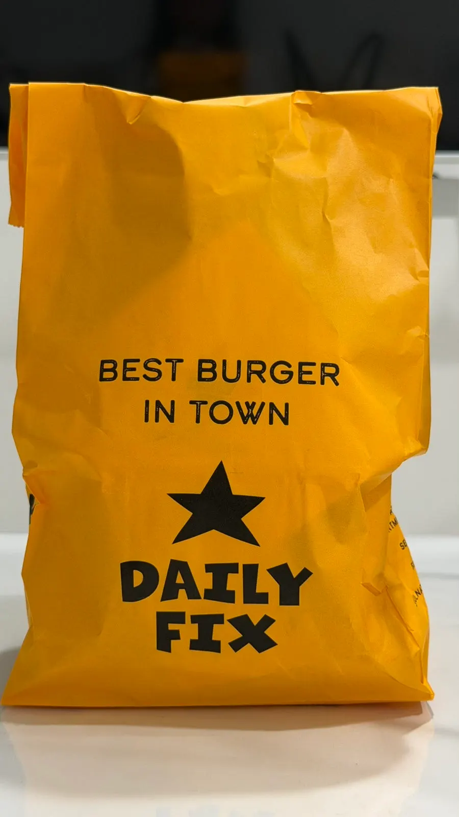 Takeout food packed separately by dish in paper boxes
