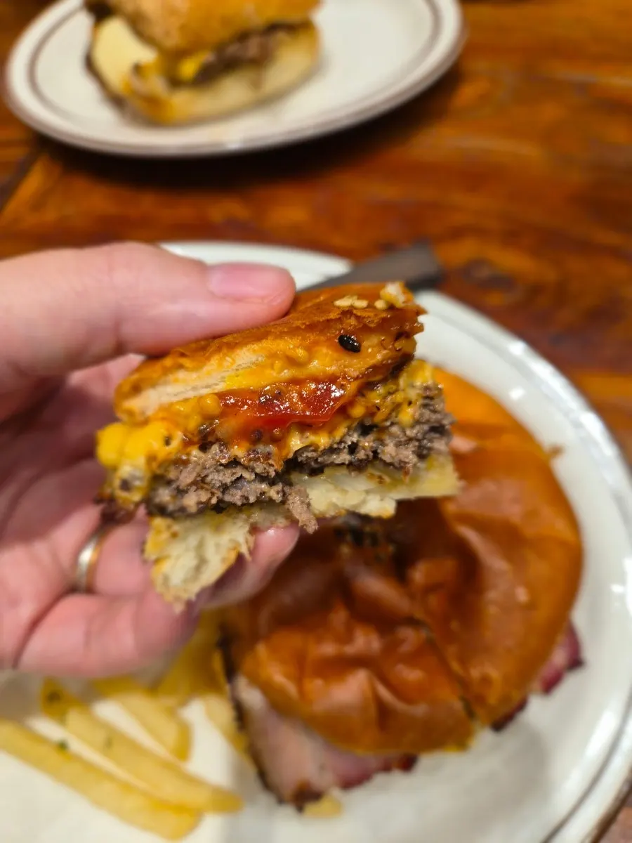 A bite taken out of the handmade burger
