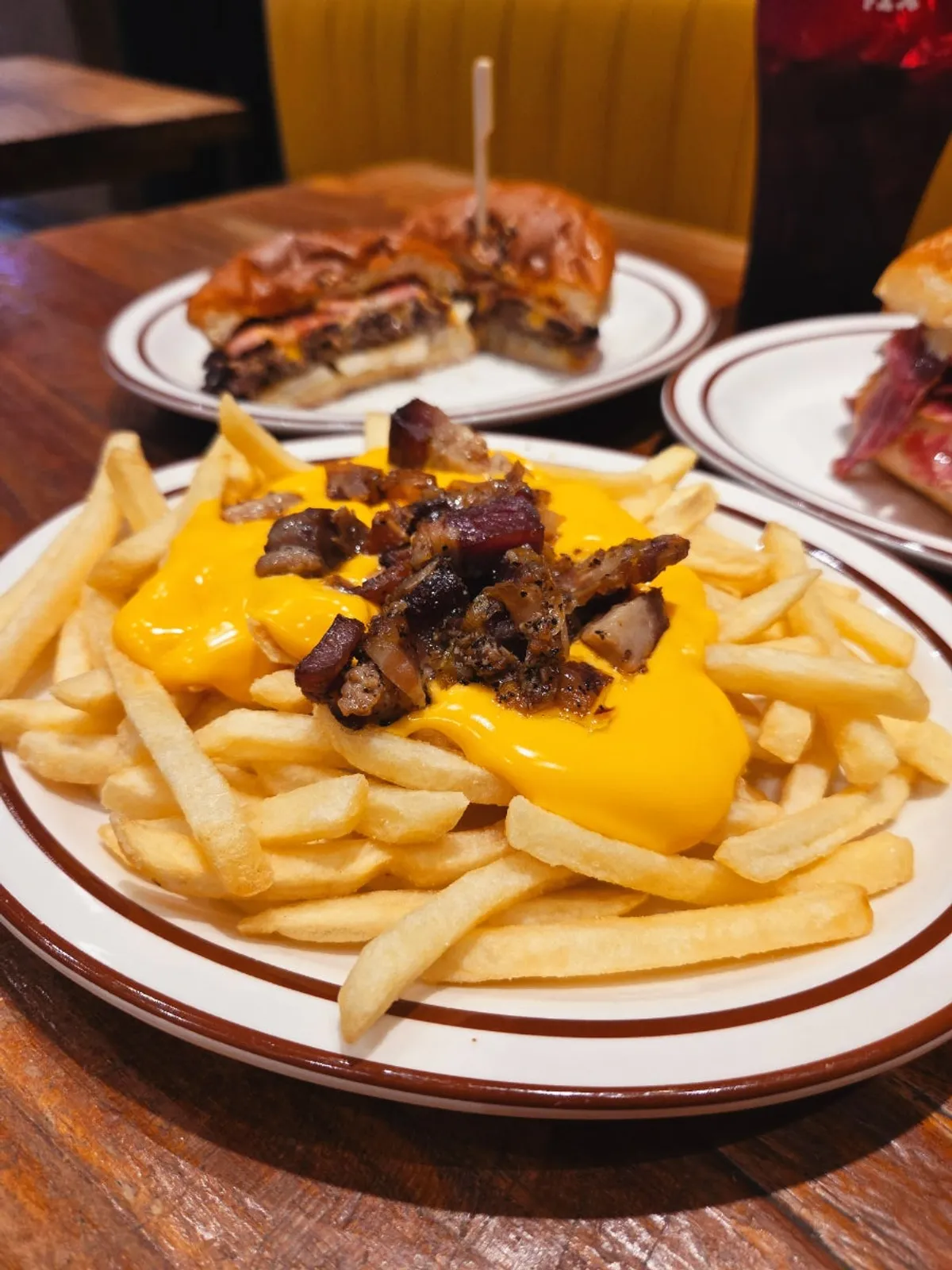 A plate of Daily Fix's bacon cheese fries