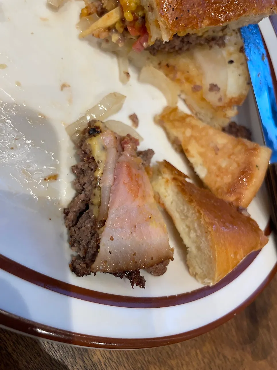 Cross-section showing thick bacon slices in the burger