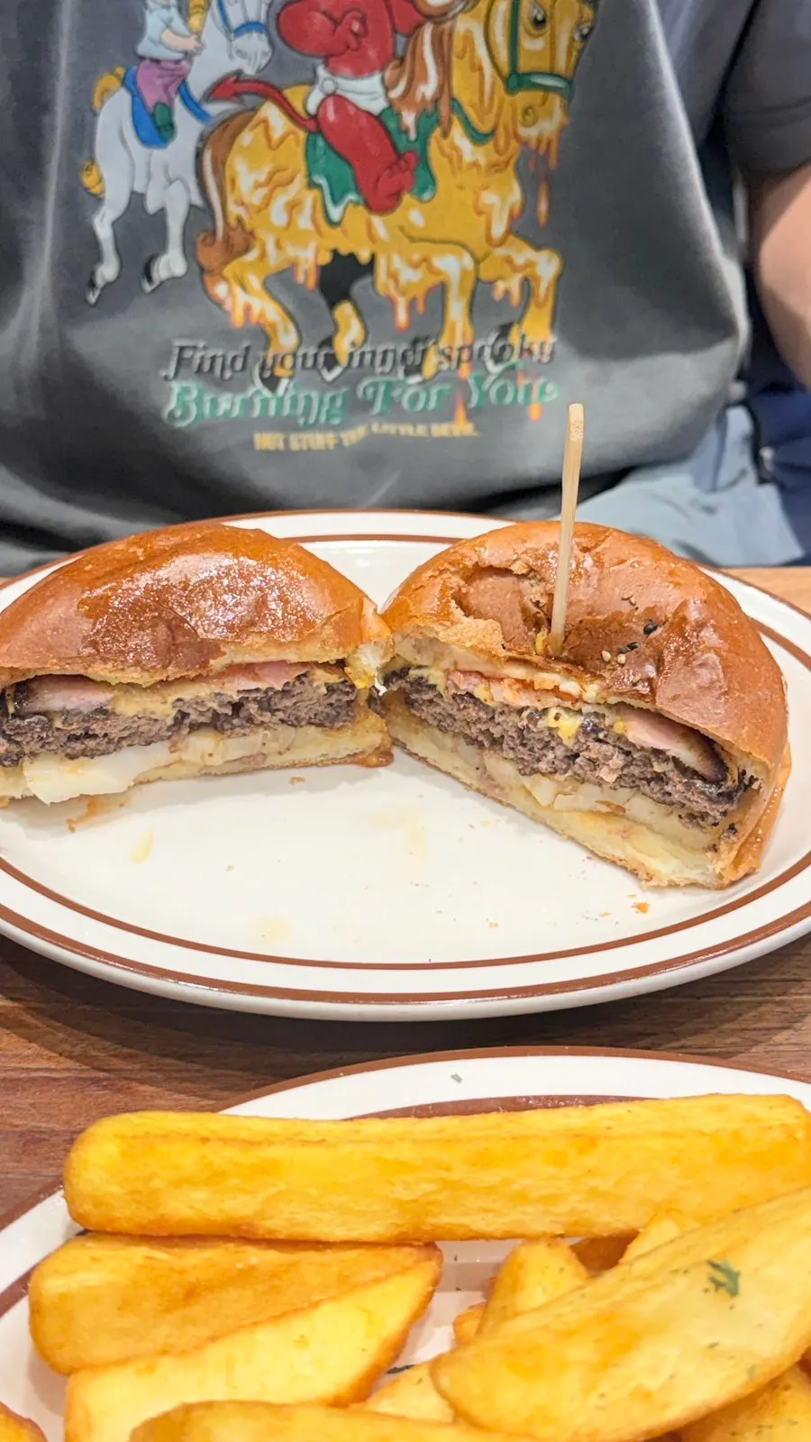 Cross-section of the bacon cheeseburger after one bite