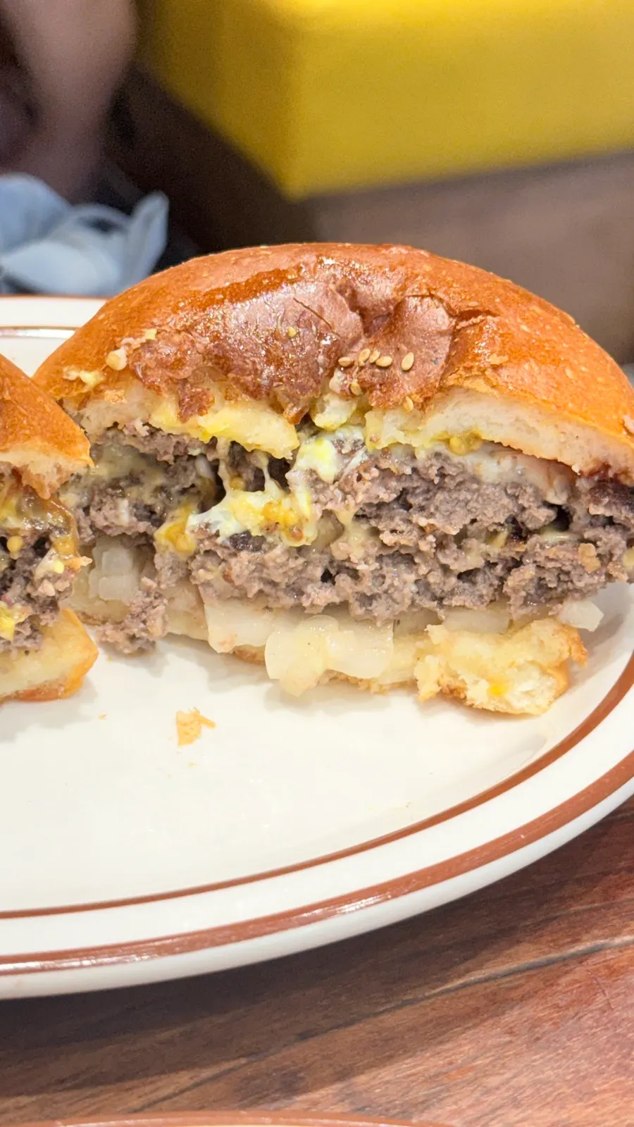 Double cheeseburger with melted American and Swiss cheese