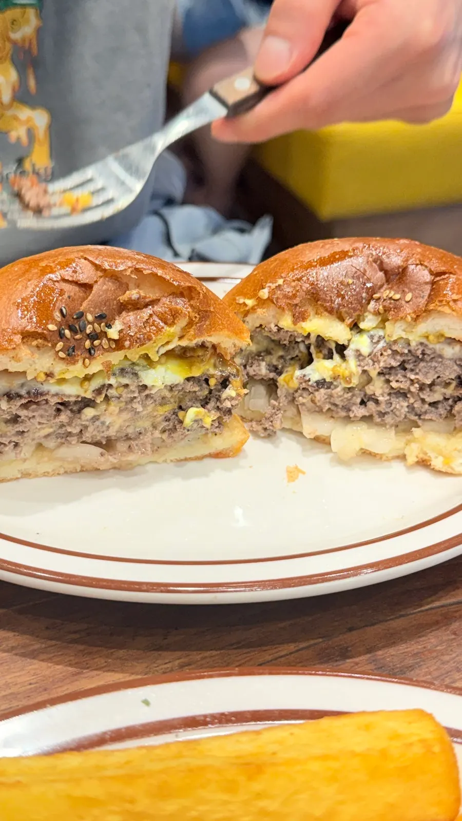 Cross-section of the double cheeseburger showing the juices