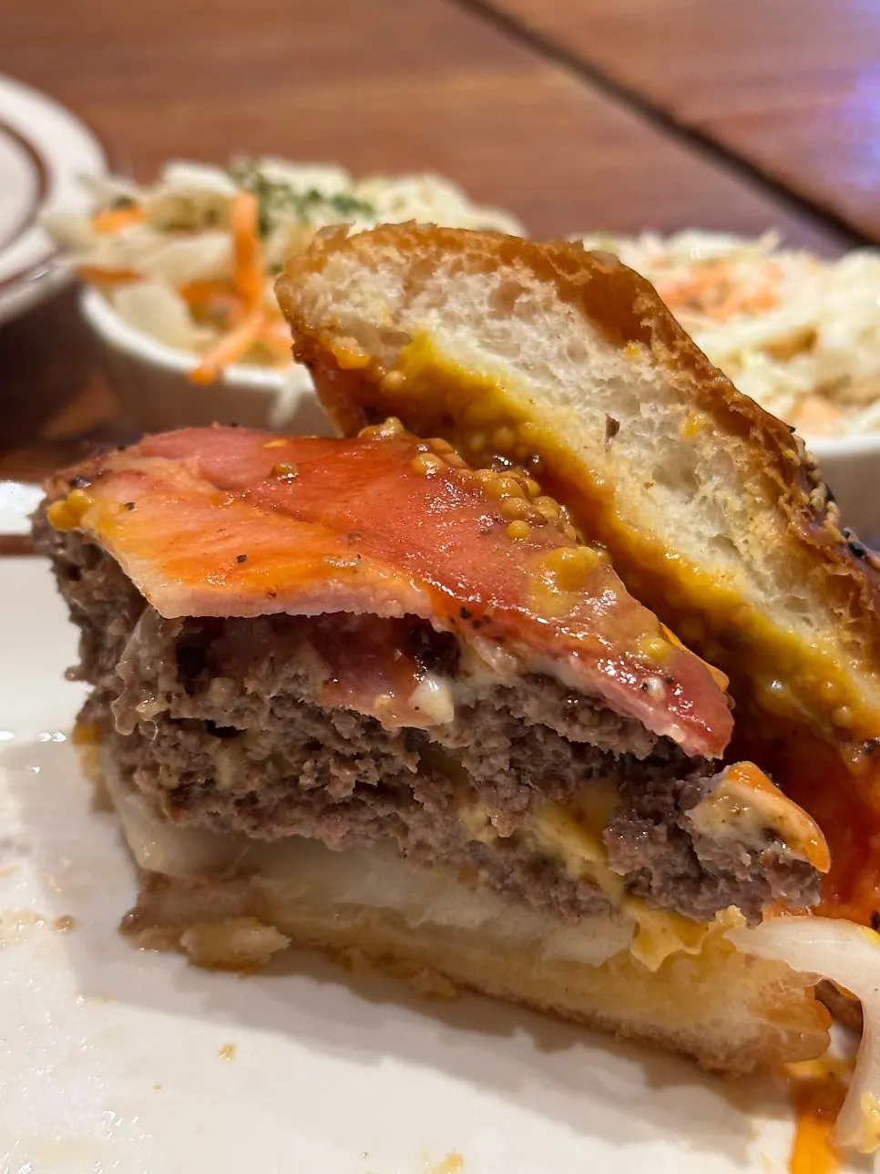 Double cheeseburger from Daily Fix held in hand