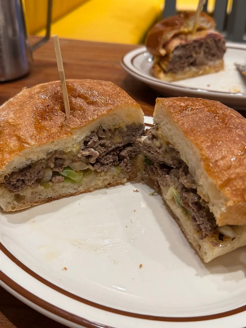 Cross-section of the Philly cheesesteak sandwich with 170g added Korean beef patty