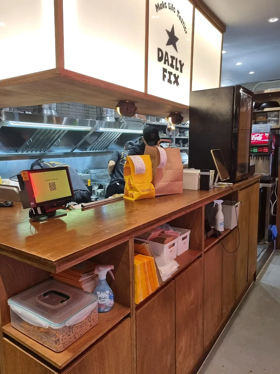 Separate ordering and cooking area inside the restaurant