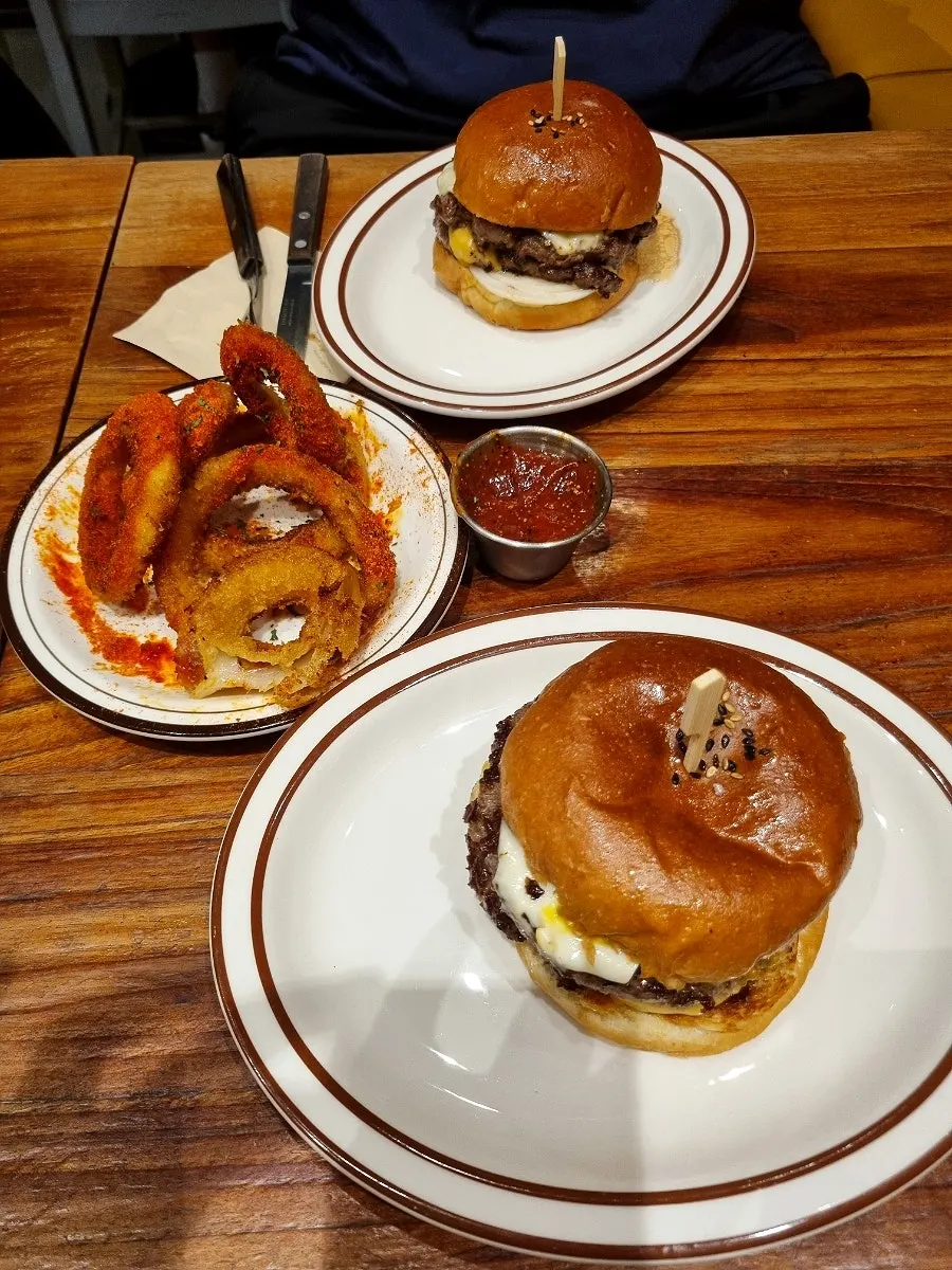 Double cheeseburger served at the table