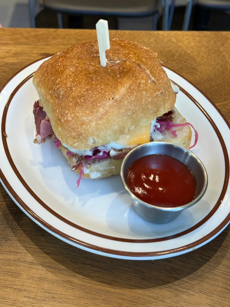 Plate of Daily Fix's Pastrami Sandwich