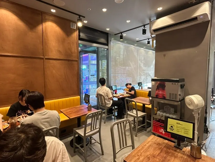 Solo-dining seat with a window view at Daily Fix