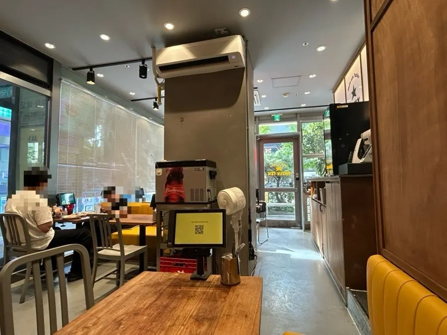 Window seat overlooking trees at Daily Fix