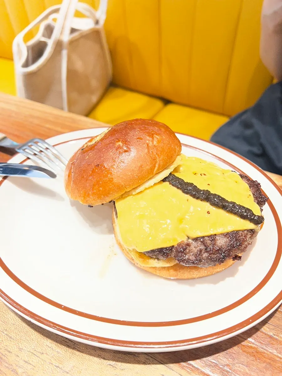 Close-up of the thick patty in the truffle mushroom burger
