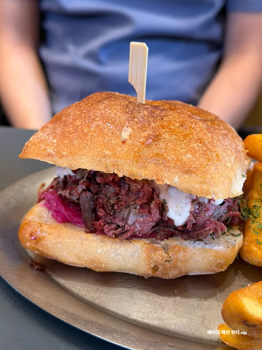 Cross-section of the Pastrami Sandwich on ciabatta bread