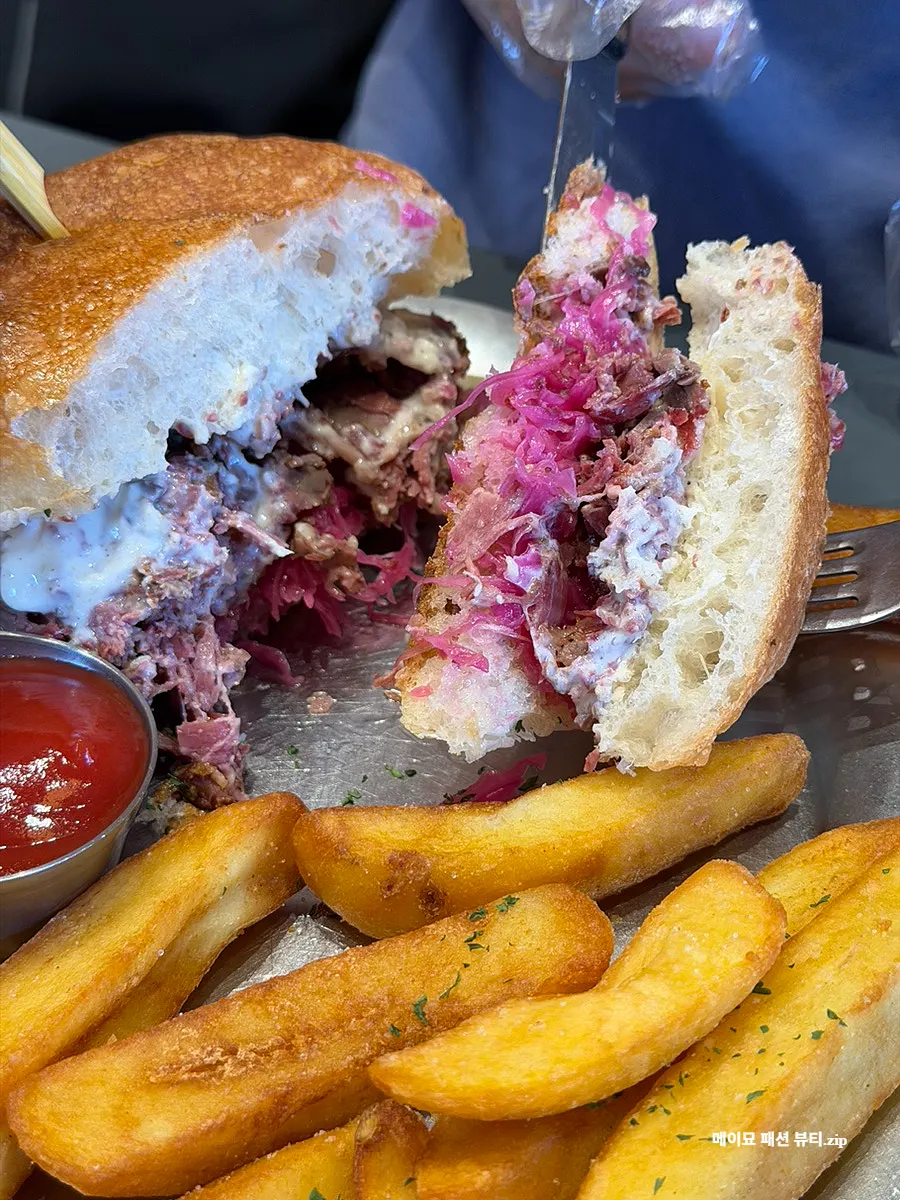 Close-up of the packed cured, smoked pastrami filling
