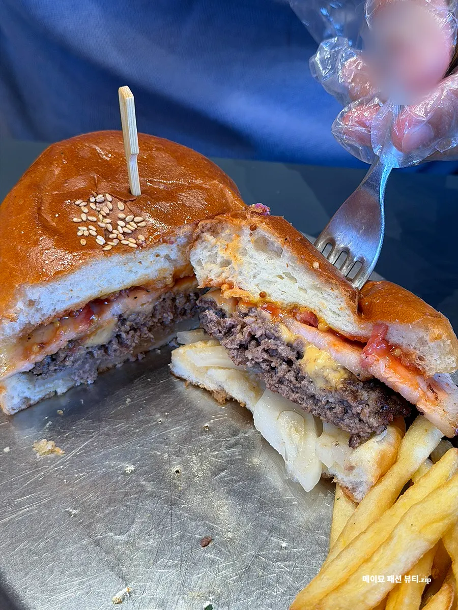Cross-section of burger with Korean beef patty and handmade bacon