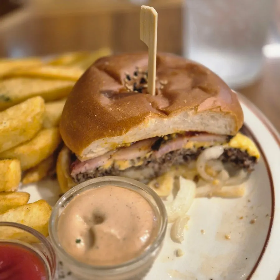 Thick house-smoked bacon layered inside the burger