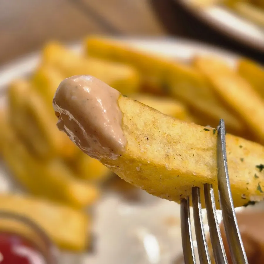Signature sauce served alongside the fries