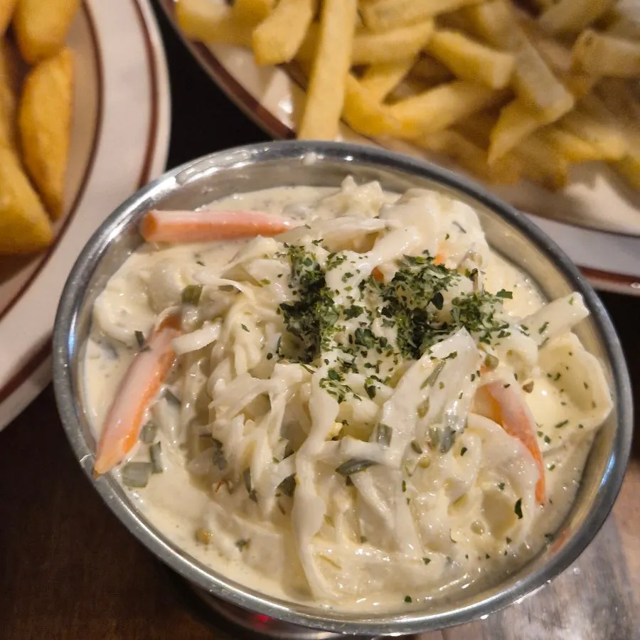 Coleslaw served to balance the richness of the meal