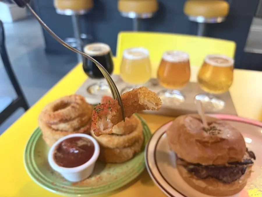Crispy fried onion rings with sauce