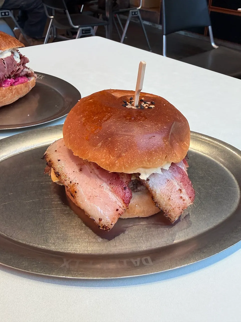 The Pastrami Sandwich cut in half