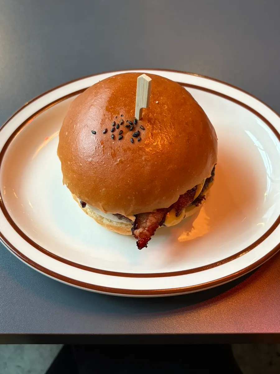 A hearty burger paired with soda