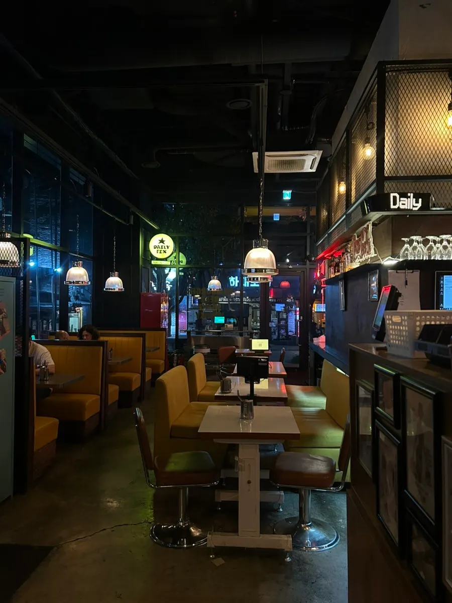 Yellow leather sofa seats and retro lighting