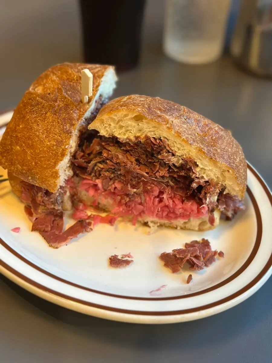 Pastrami sandwich with mayo sauce and cabbage