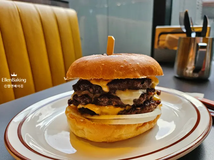 A bite taken out of the pastrami sandwich