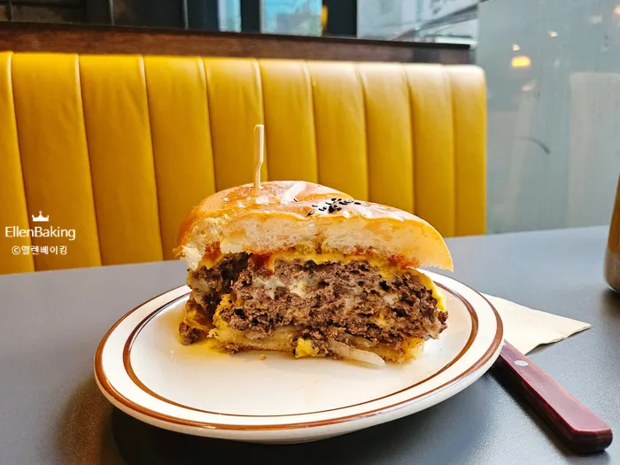 Close-up of the 450g hanwoo triple-patty burger
