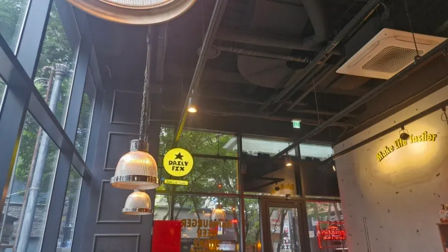View of the Daily Fix dining hall with cozy lighting