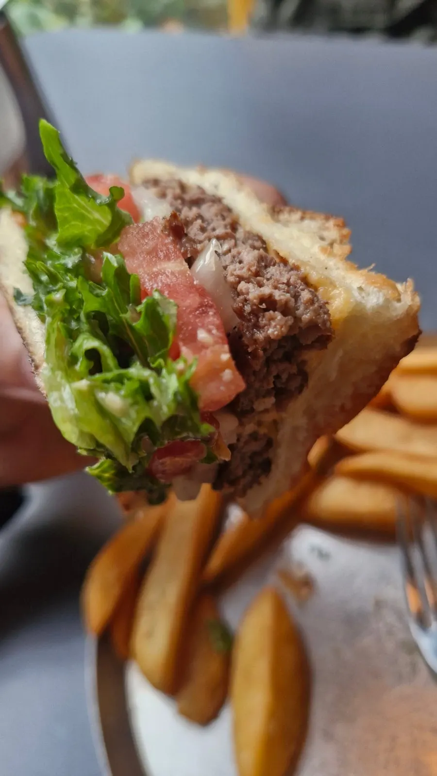 Layers of vegetables and patty in the classic burger