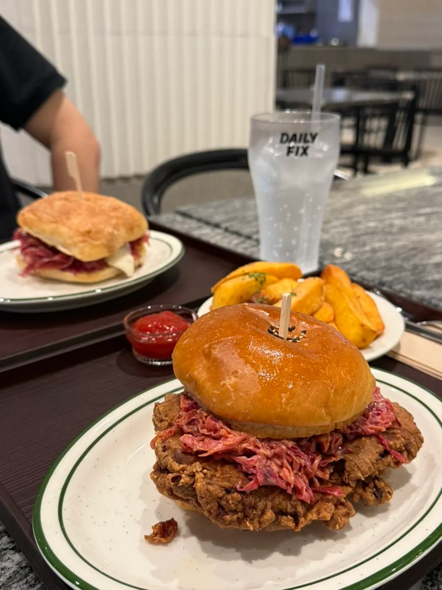 The ordered chicken burger set and pastrami burger