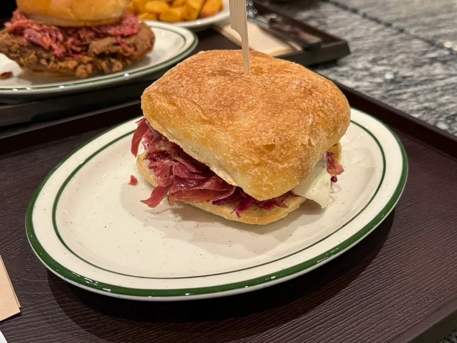 Smoked pastrami patty with visible meat grain