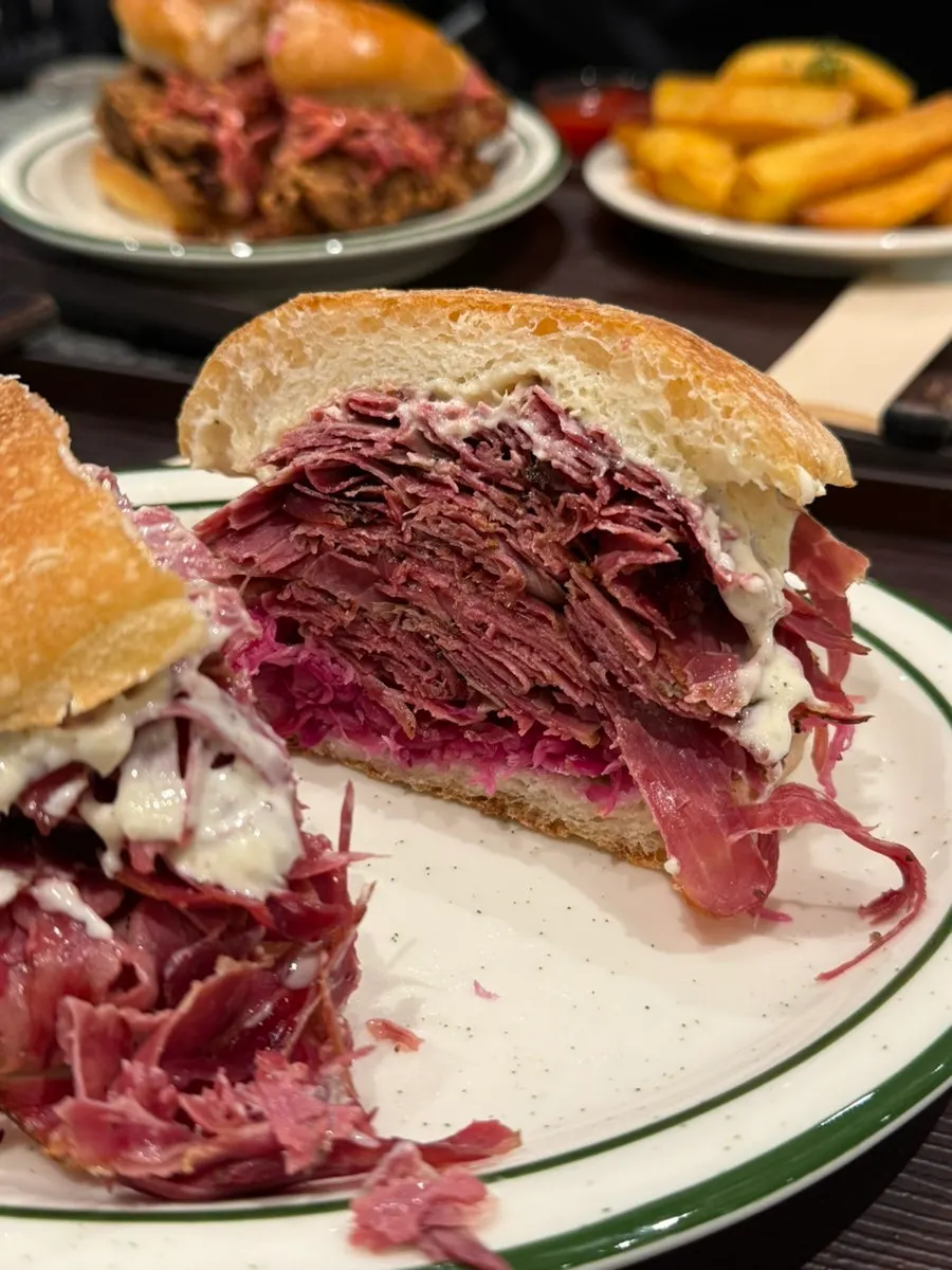 Cross-section of the thick-stacked pastrami burger