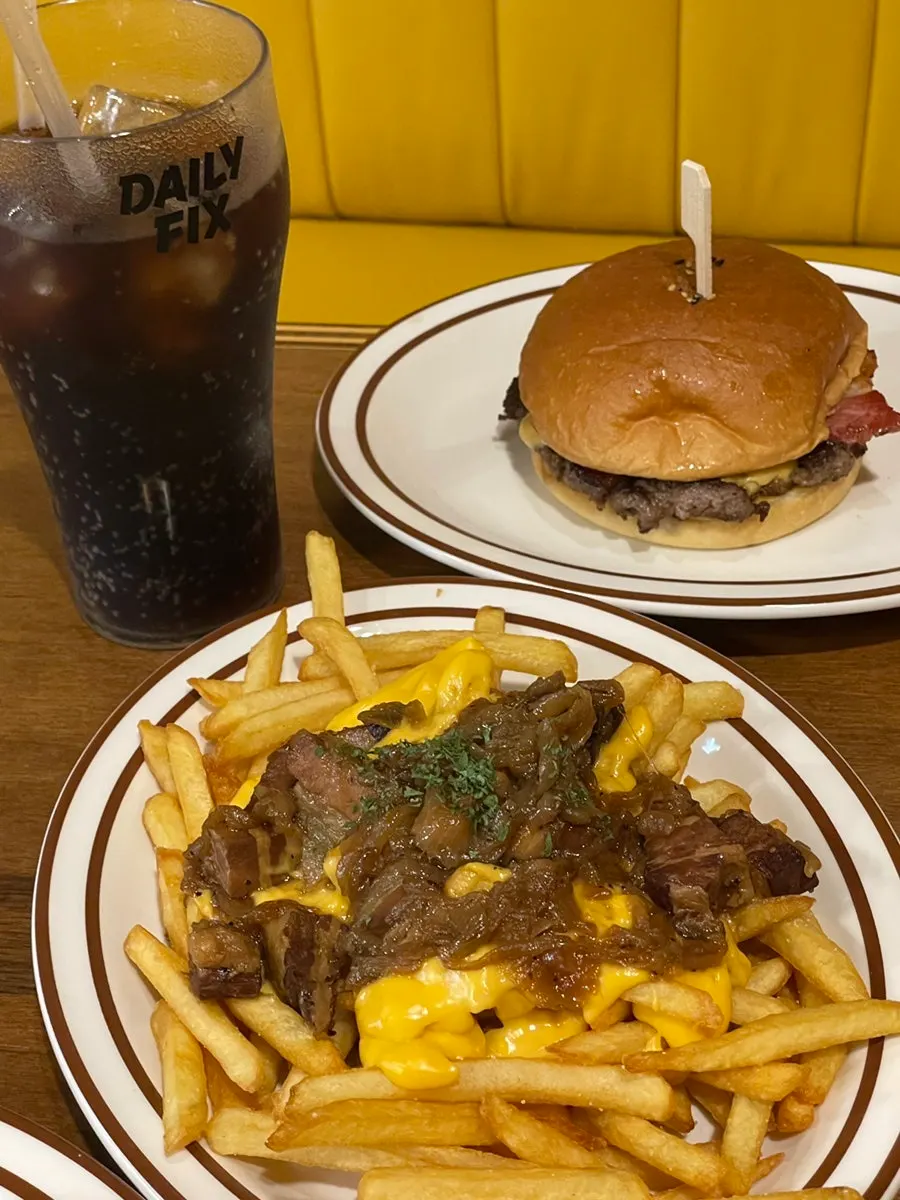 Two burgers placed side by side on the table