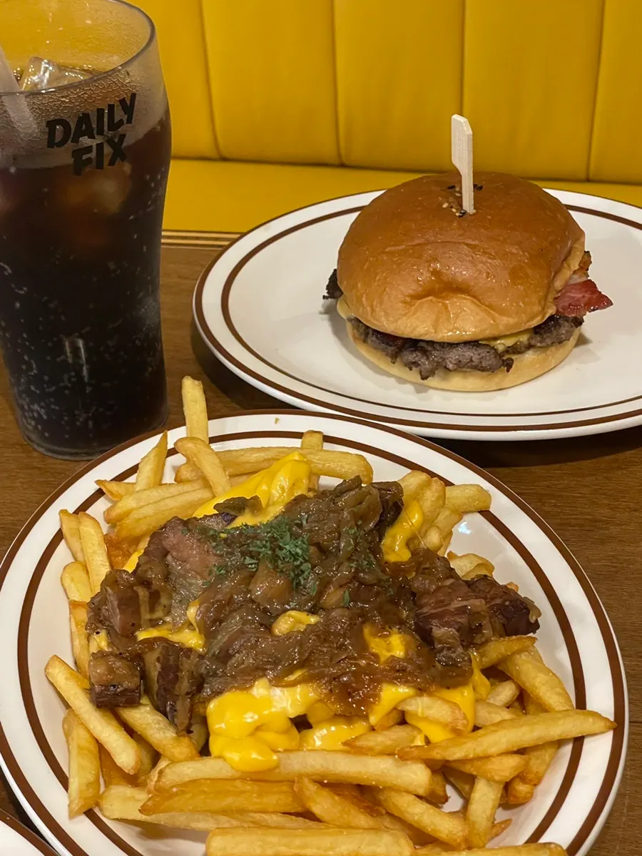 The bacon cheese burger and double cheese burger together